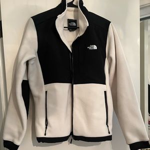 The North Face women’s cream and black jacket. Size Medium